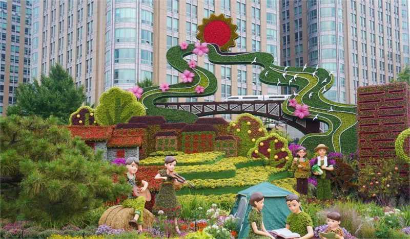 東單東南角的“共同富?！敝黝}花壇.jpg